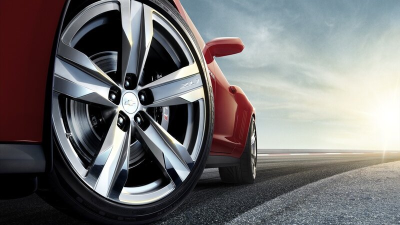 Red Car Wheel — Dramatic, Sunset