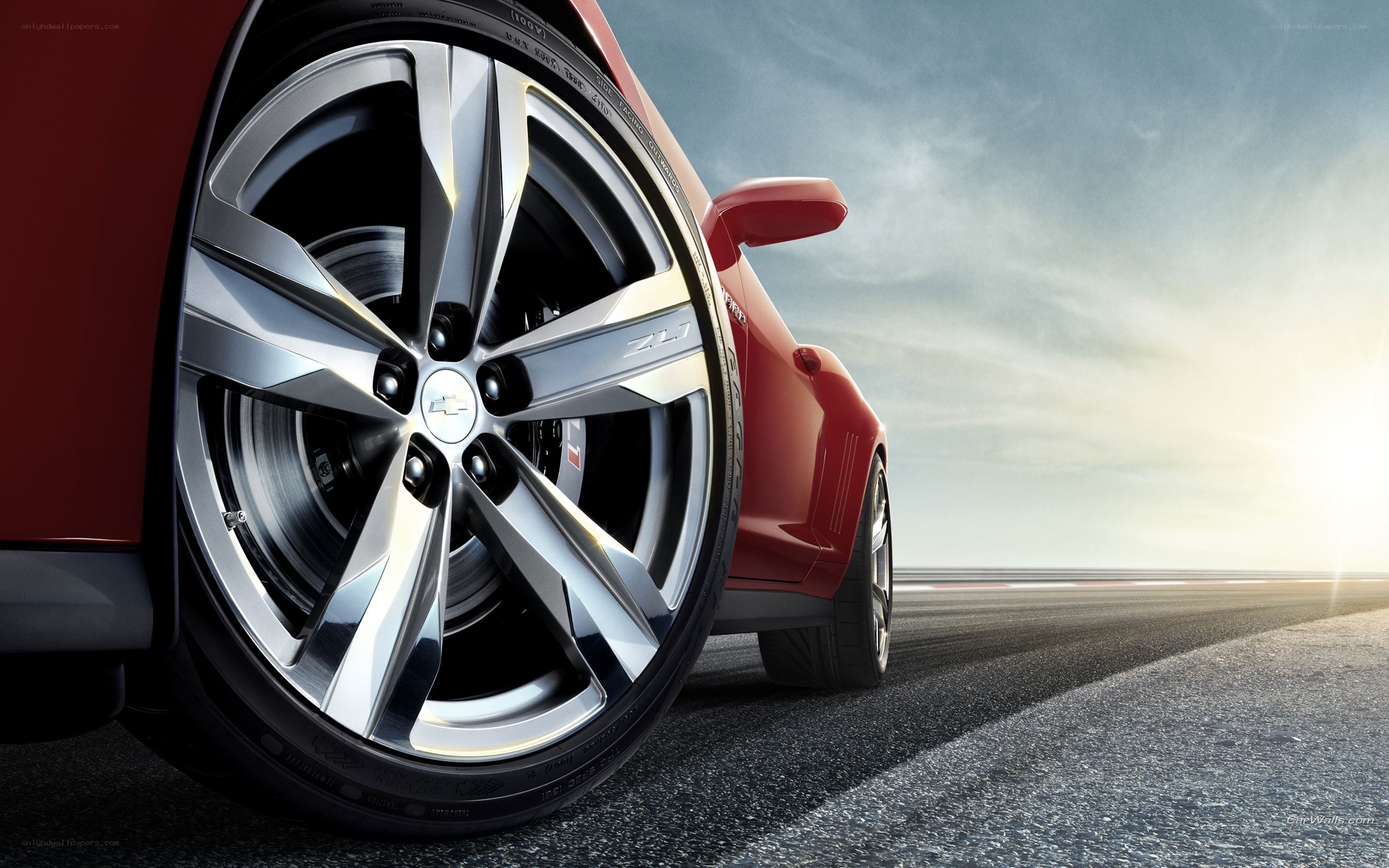 Red car wheel on track