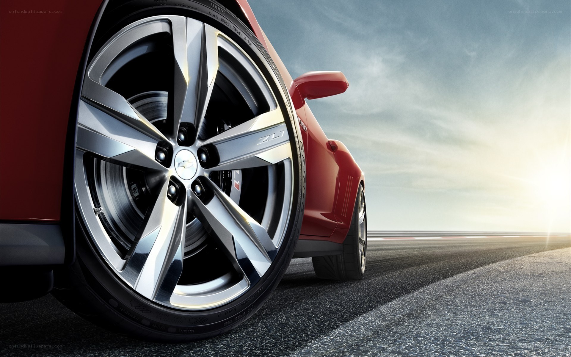 red car wheel on track