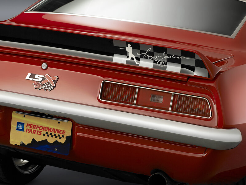red car with baseball decal