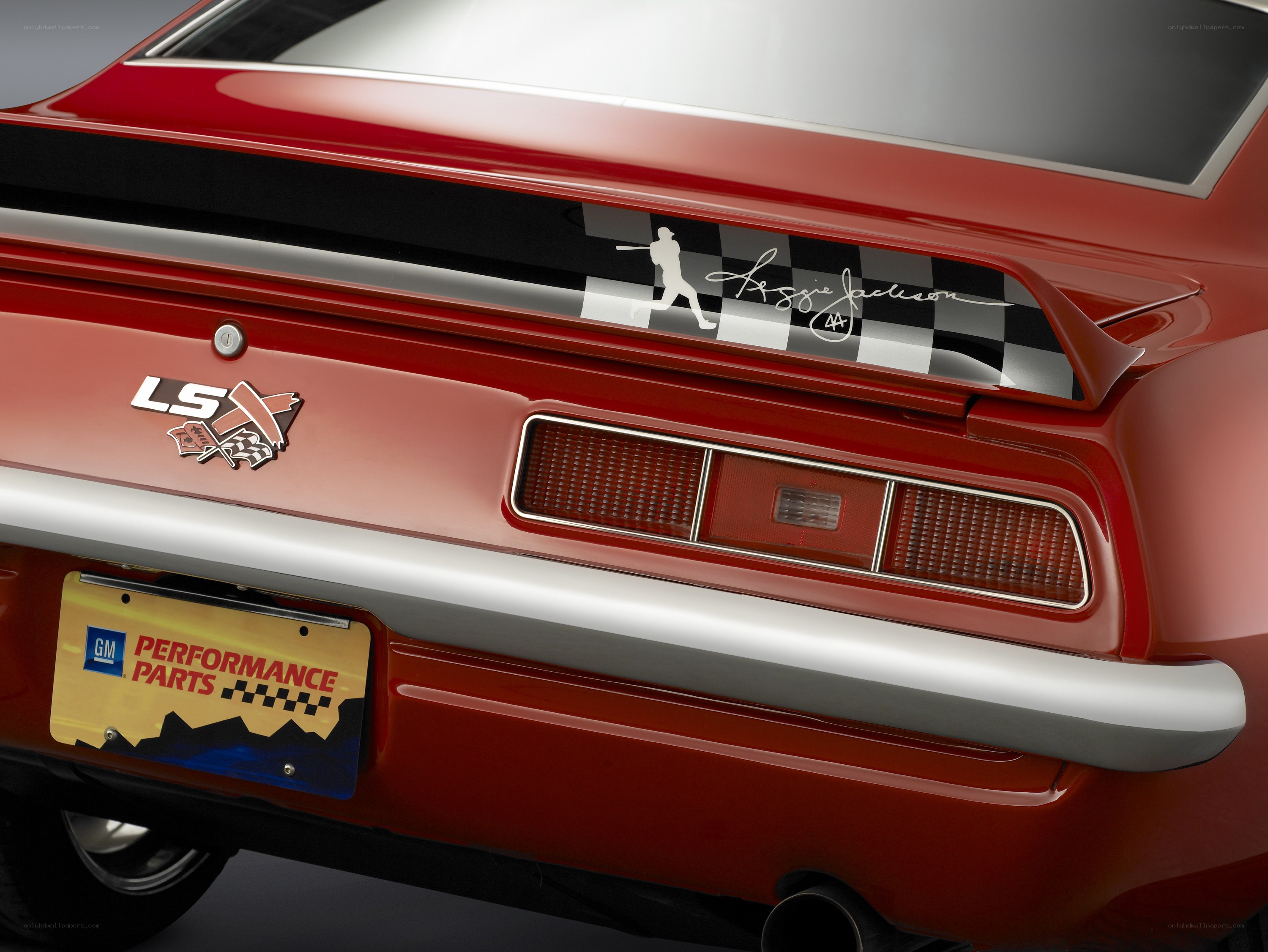 red car with baseball decal