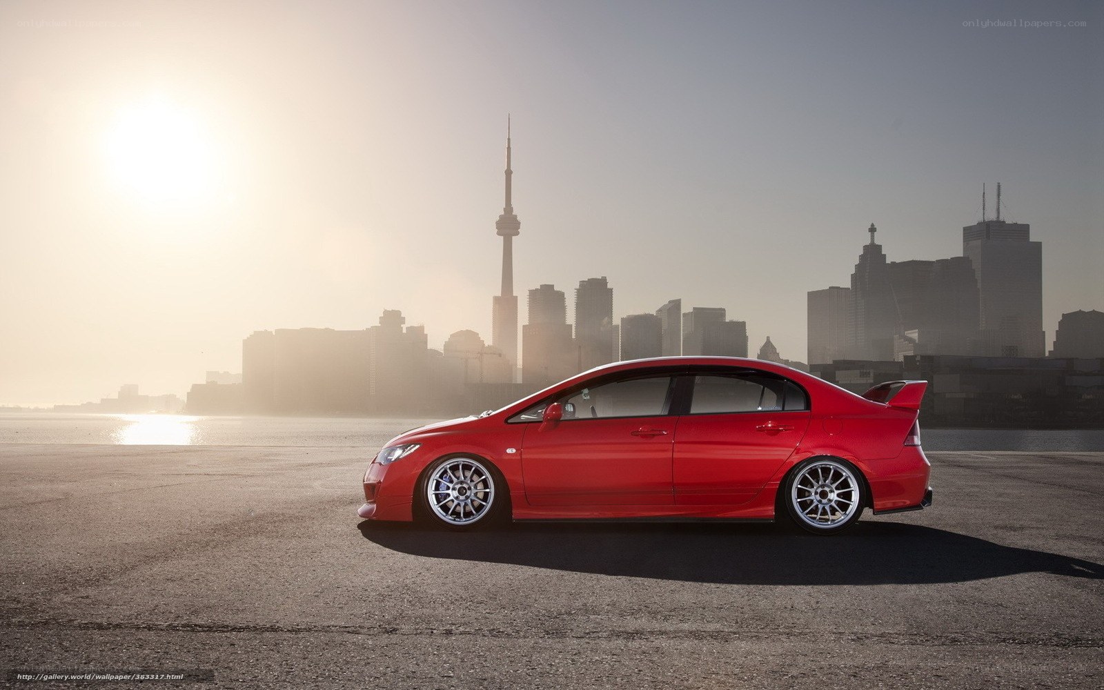 Red car with city skyline