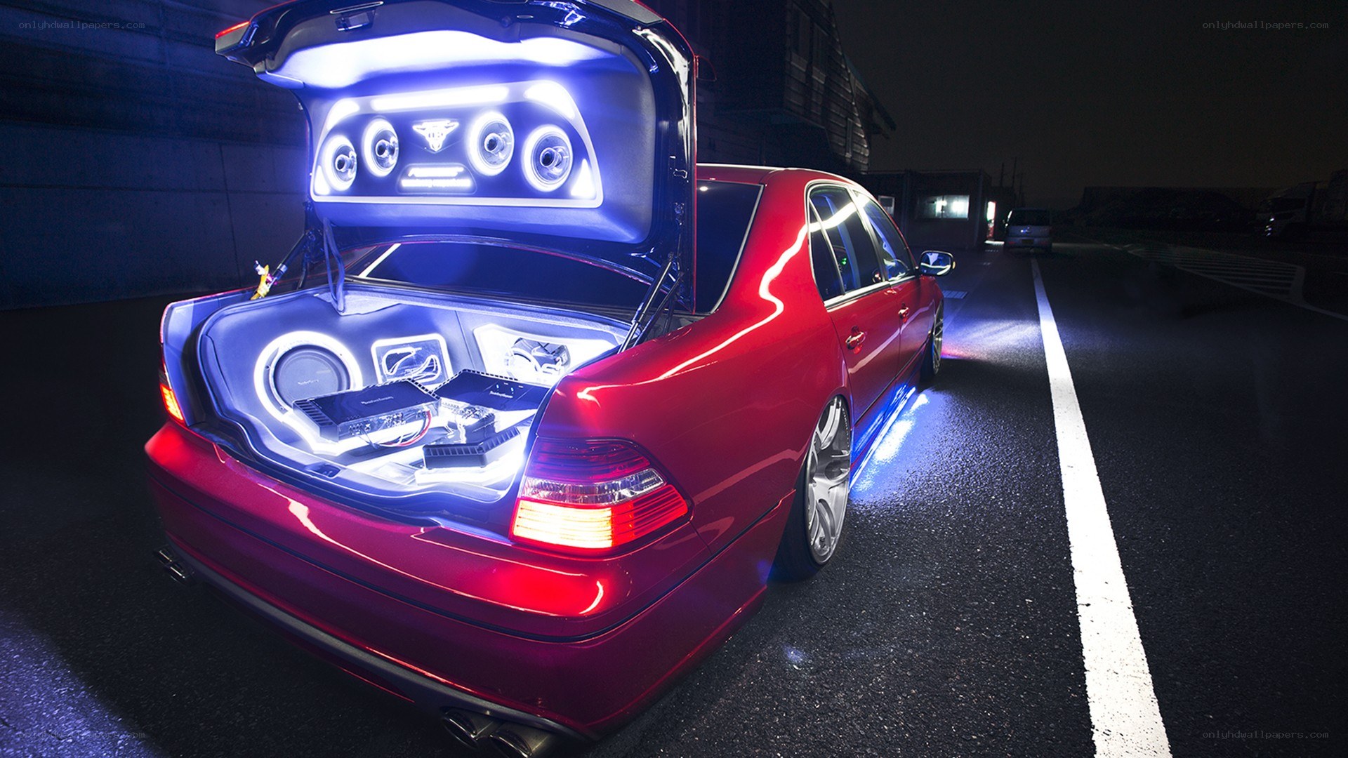 red car with custom sound system