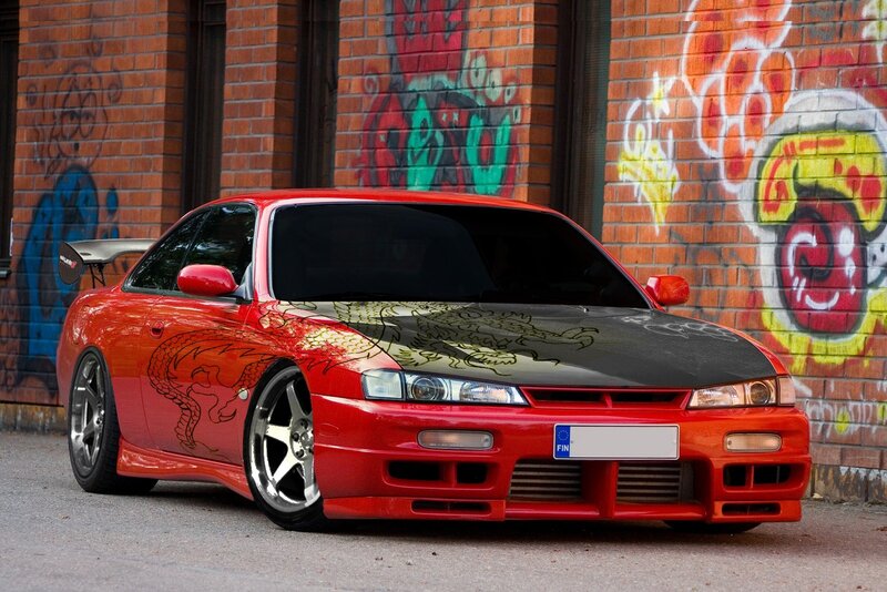 Red Car with Dragon Design — Urban