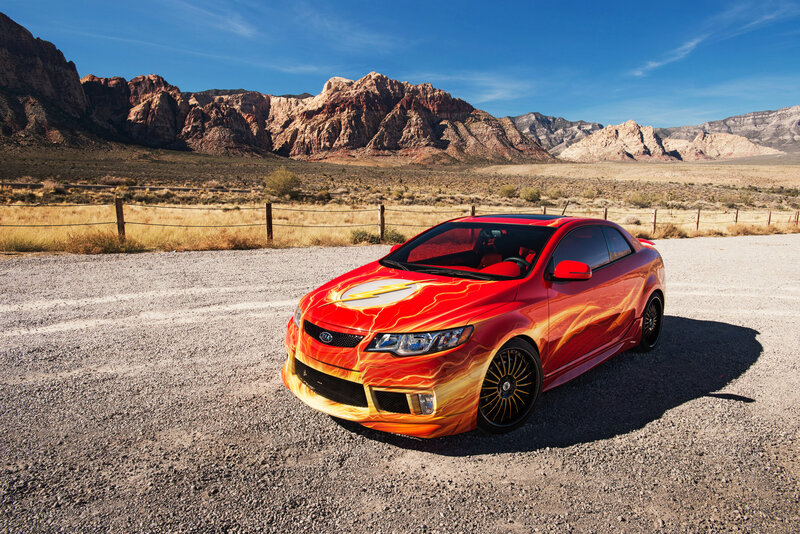 Red Car with Flame Design — Dramatic