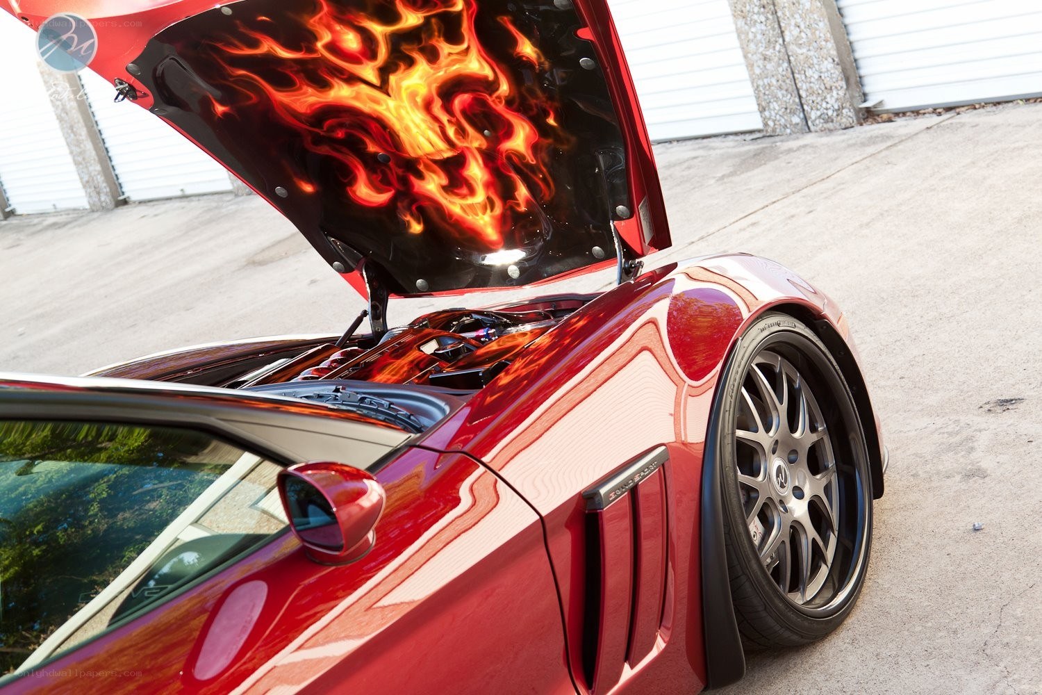 Red car with flame hood design