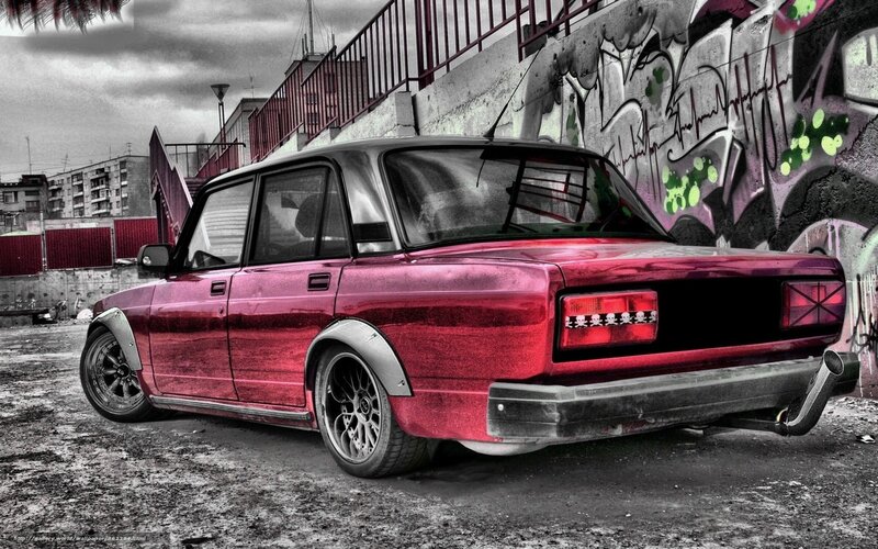 red car with graffiti background