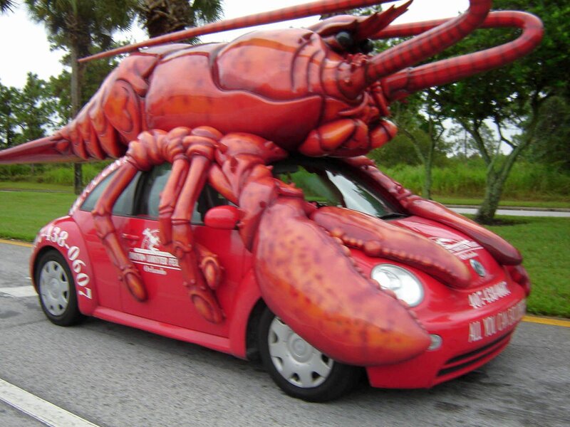 Red Car with Lobster Sculpture