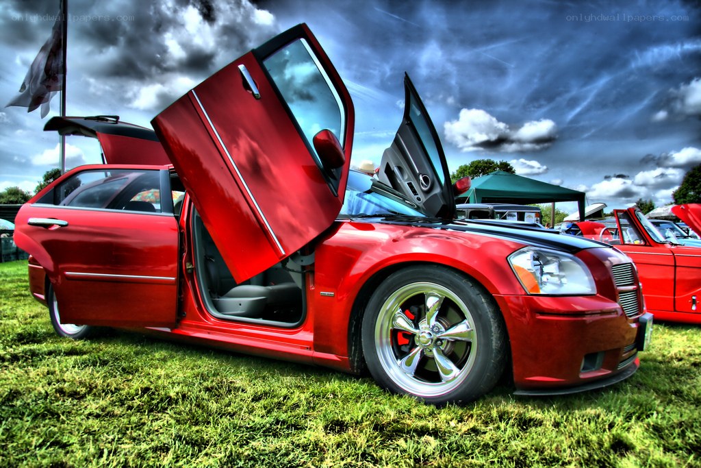 Red car with open doors