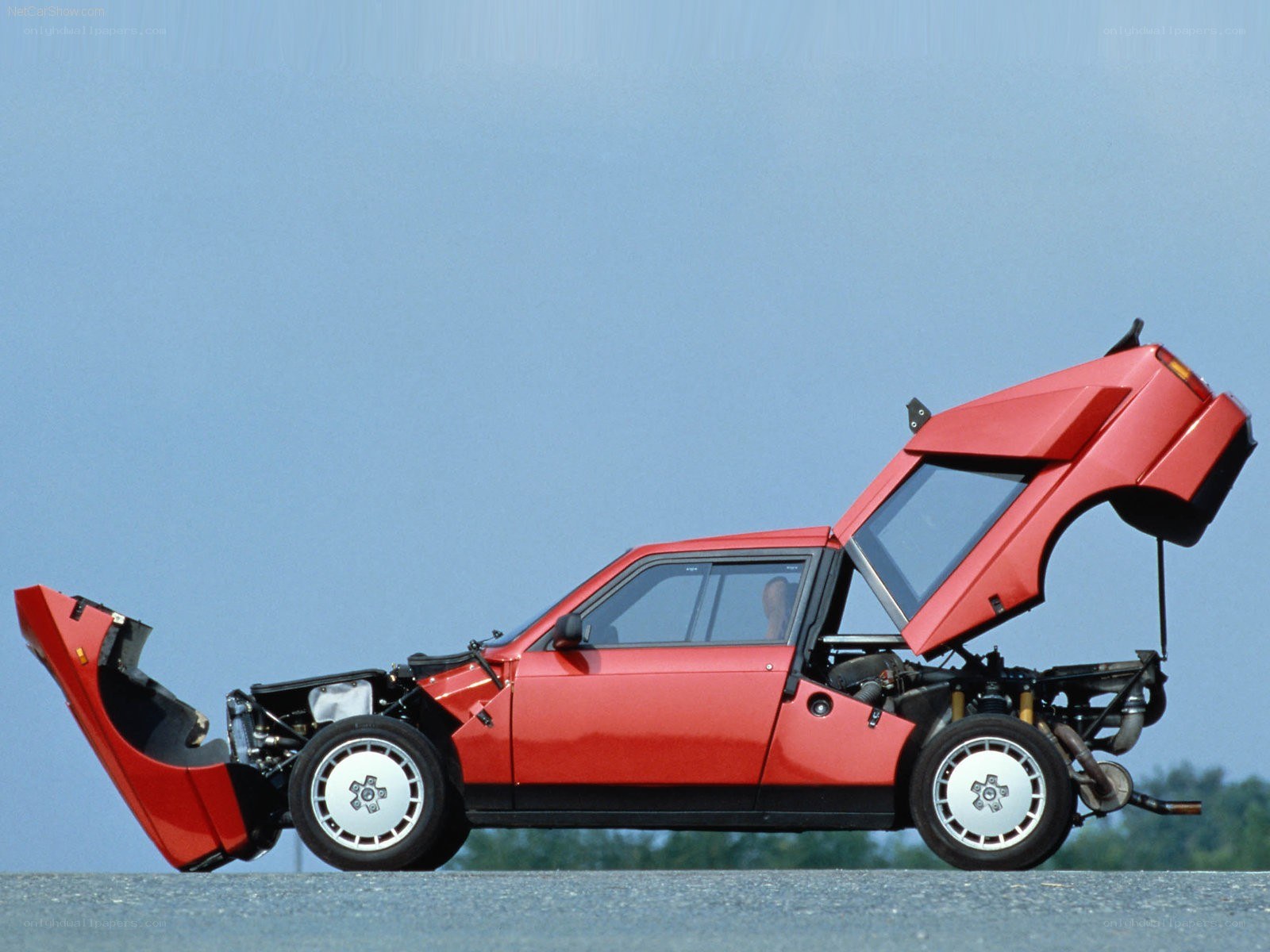 Red car with open doors