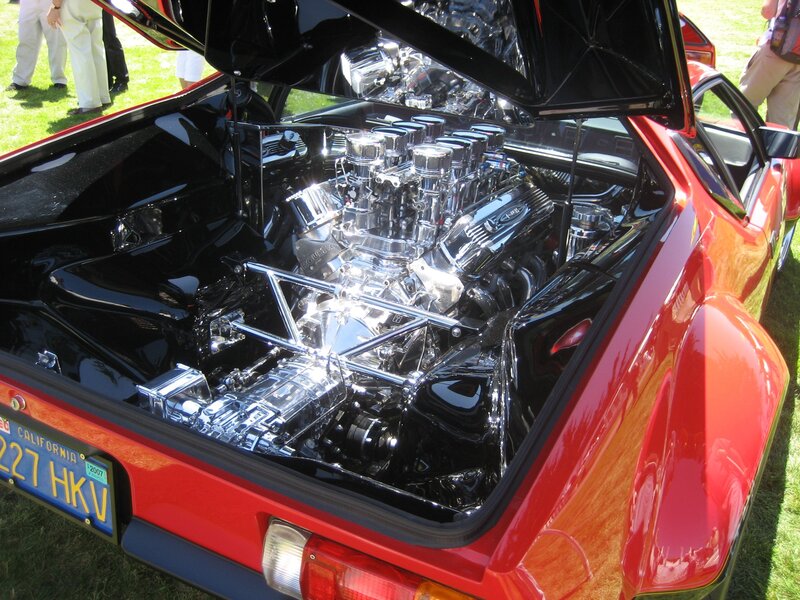Red car with open engine bay