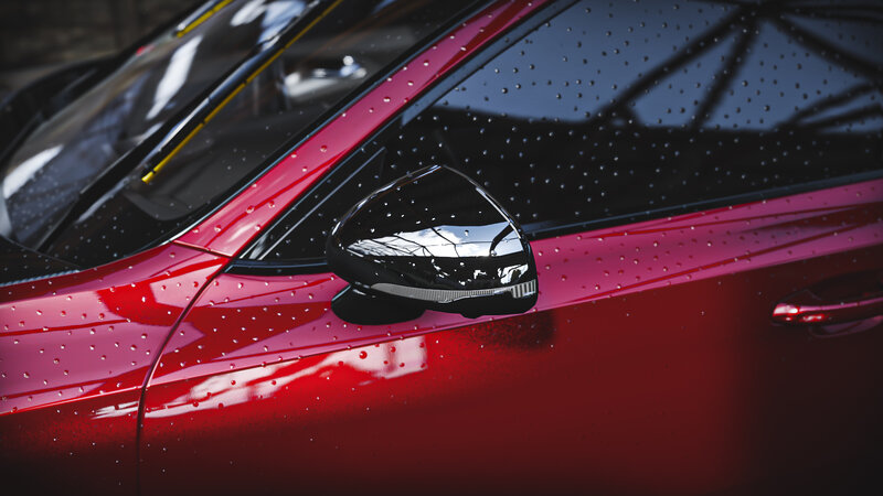 Red Car with Raindrops — Dramatic