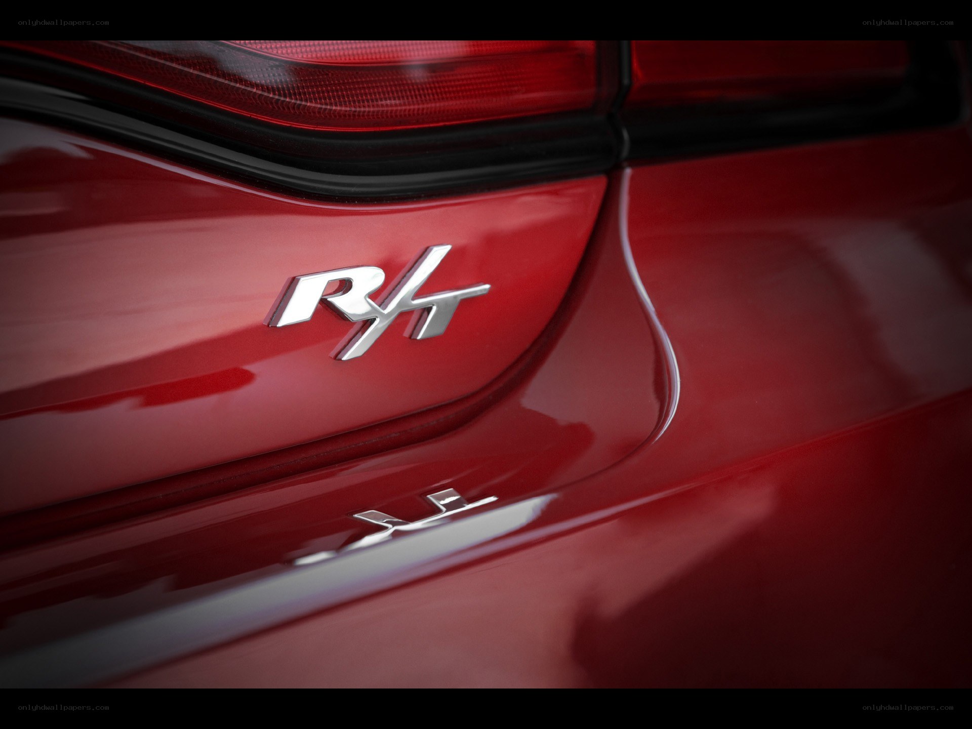 Red car with RHT badge