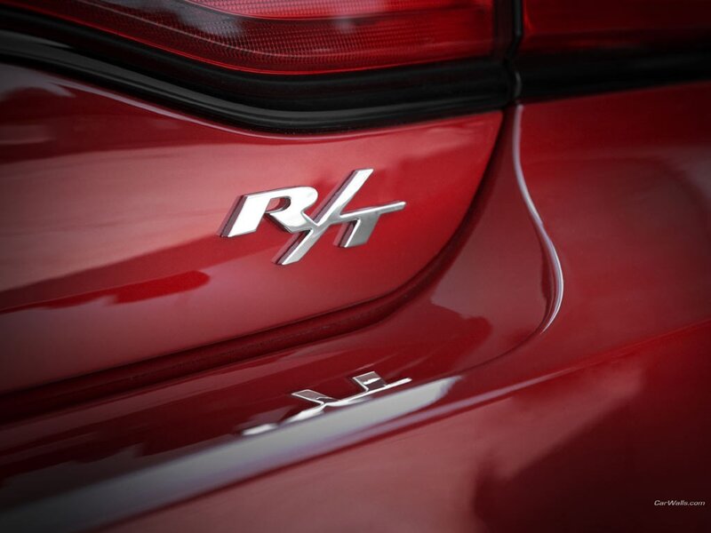 Red car with RHT badge