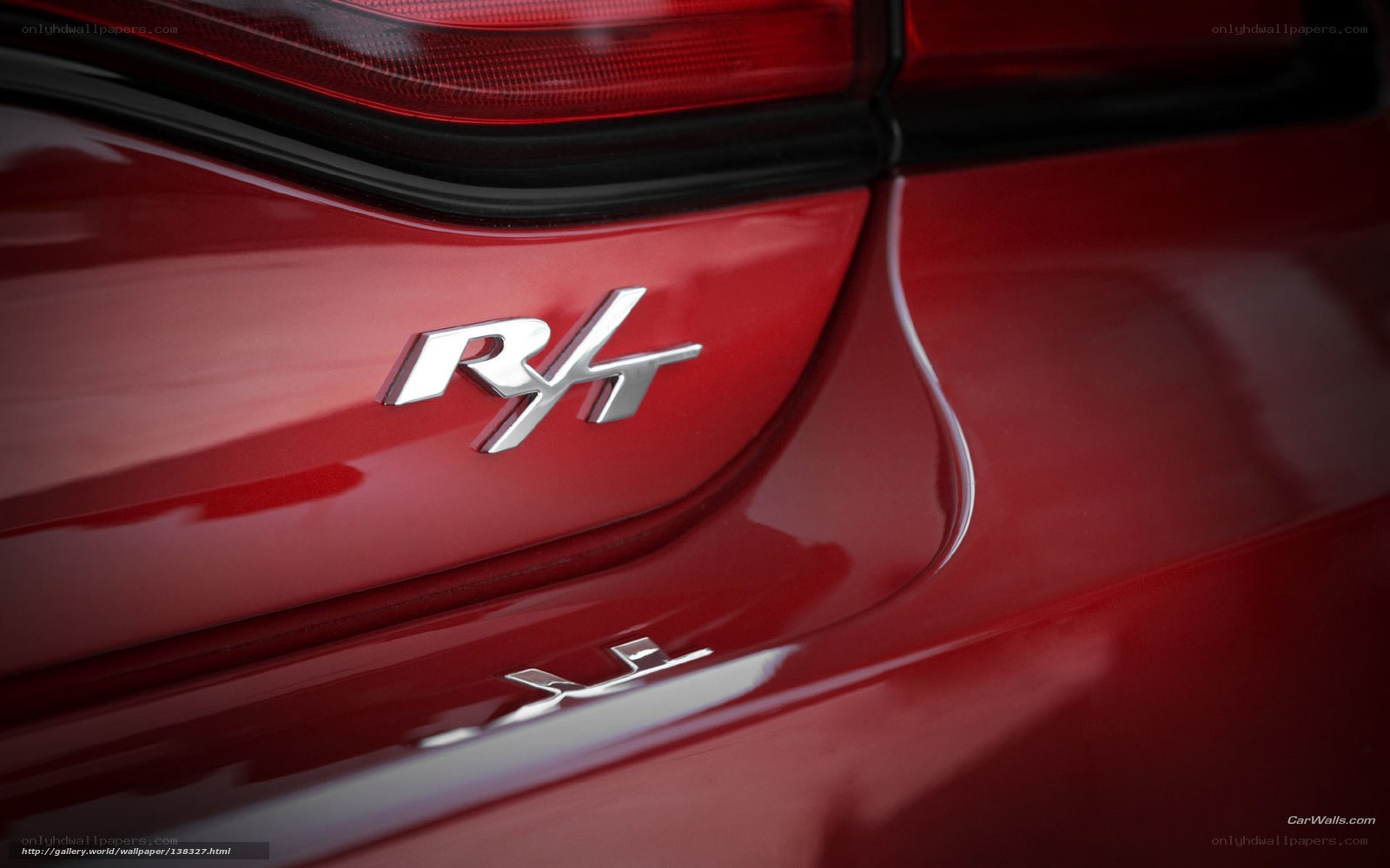 Red car with RHT badge