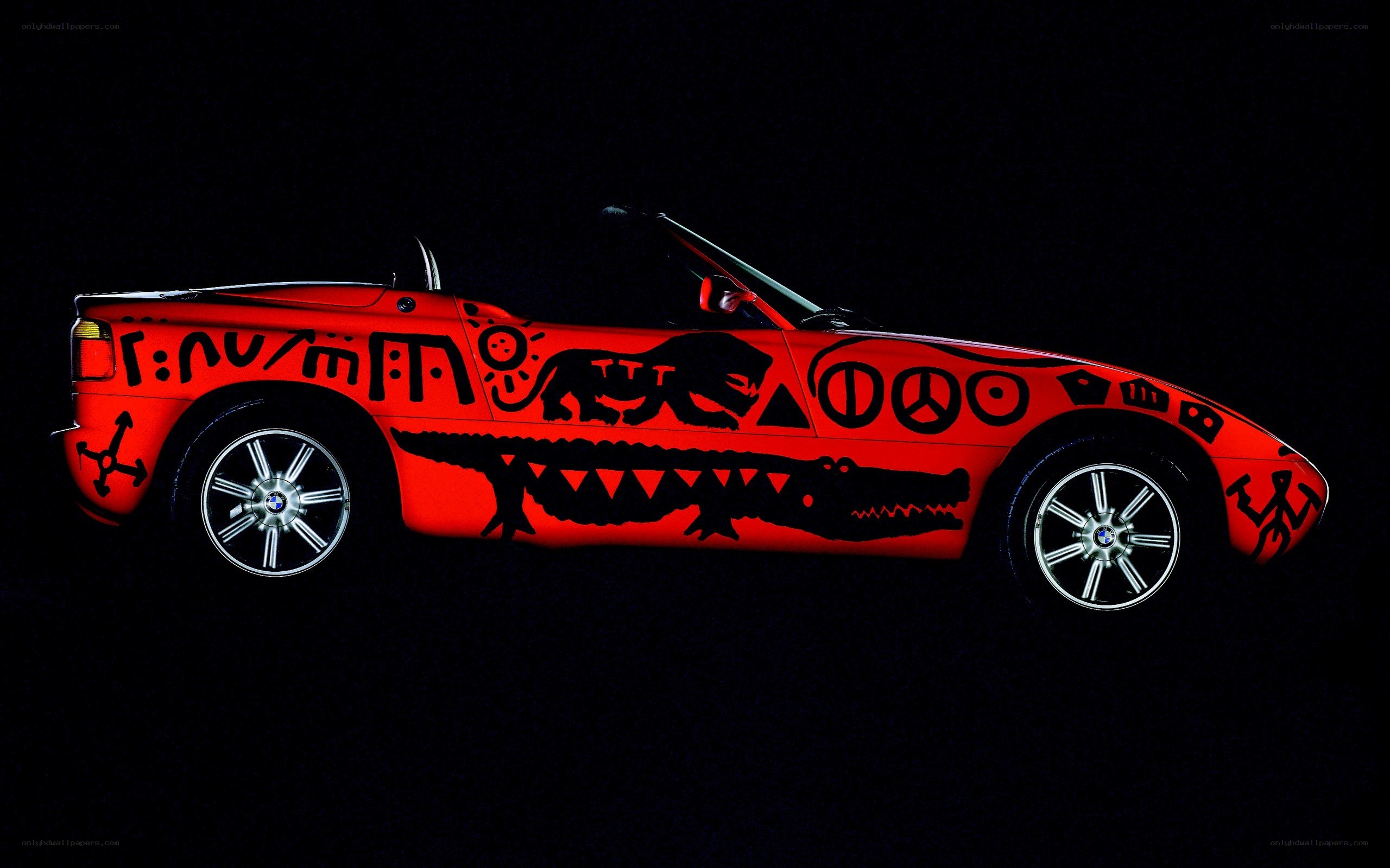 Red car with tribal art