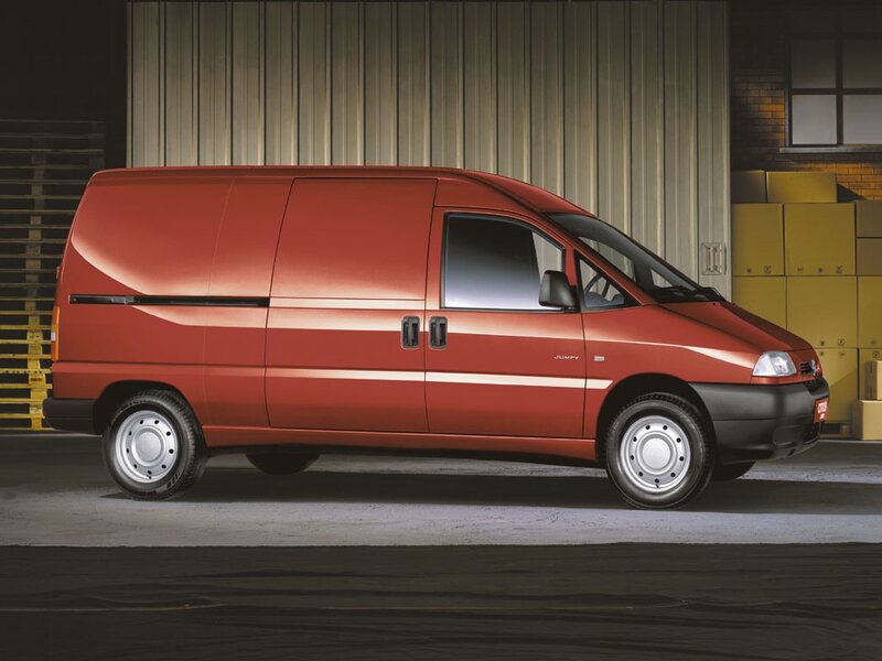 Red cargo van in warehouse