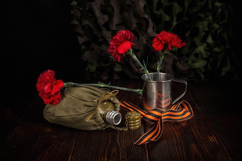 Red Carnations and Military Items