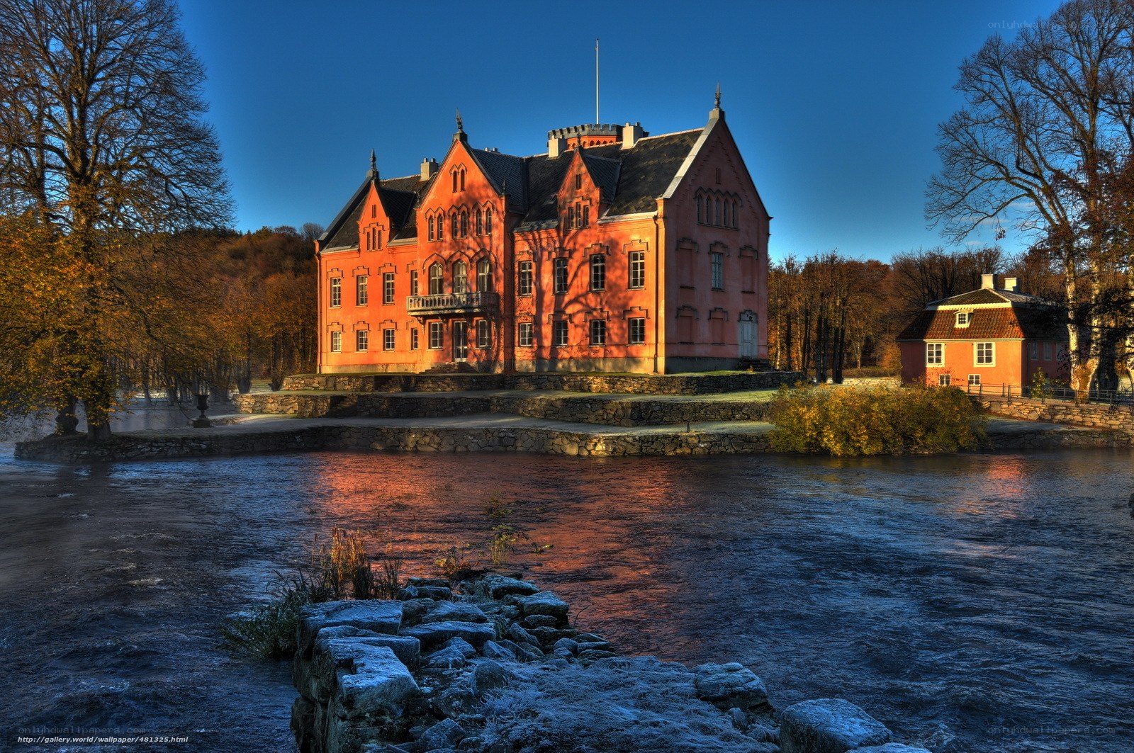 Red castle by the river