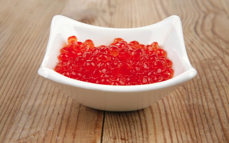 red caviar in a white bowl