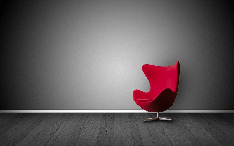 Red chair in empty room
