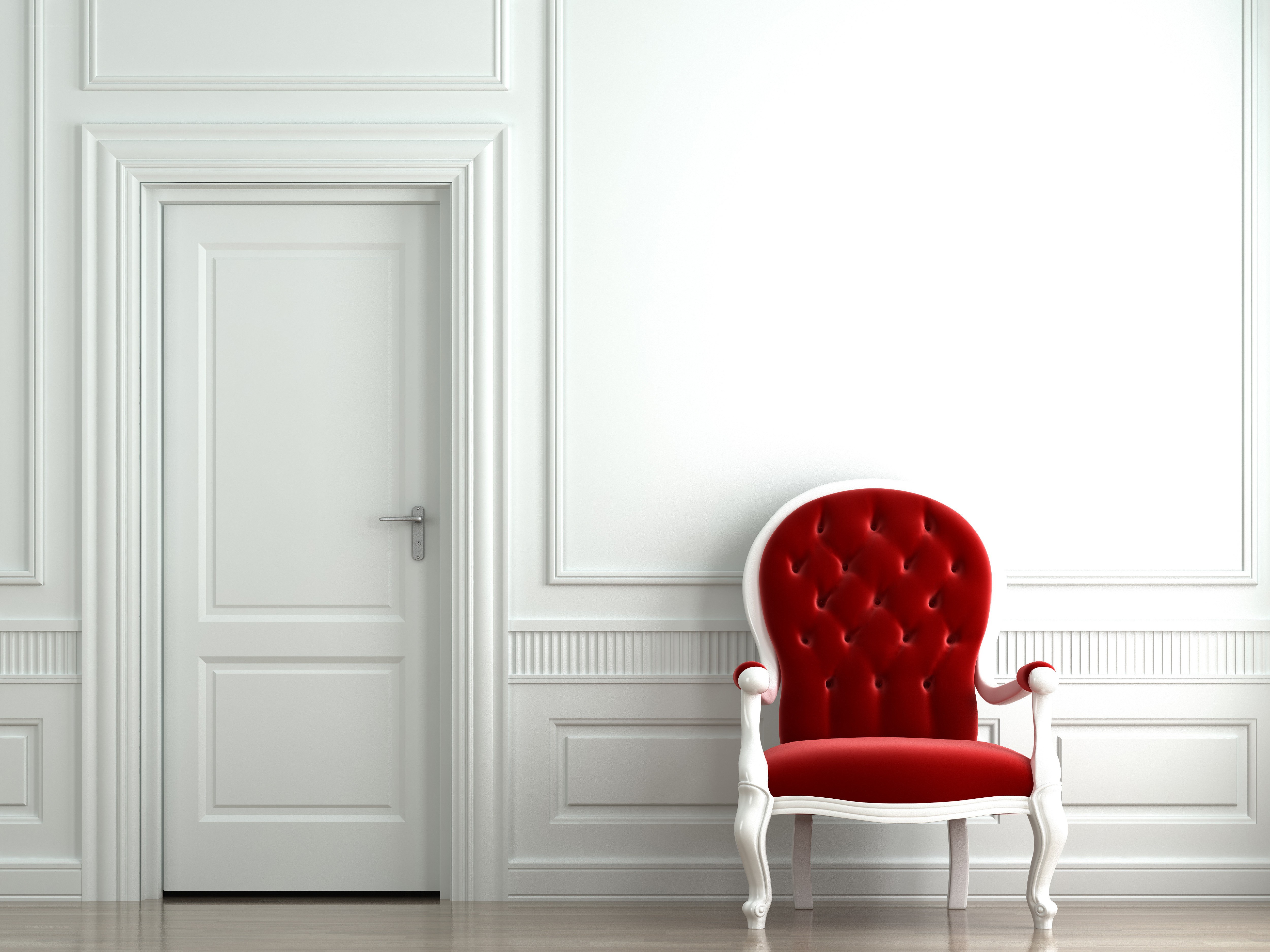 Red chair in white room