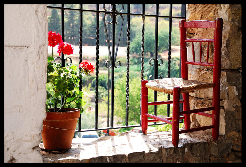 Red Chair on Balcony — Serene