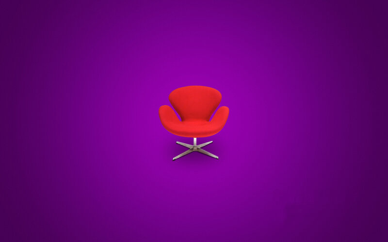 Red chair on purple background