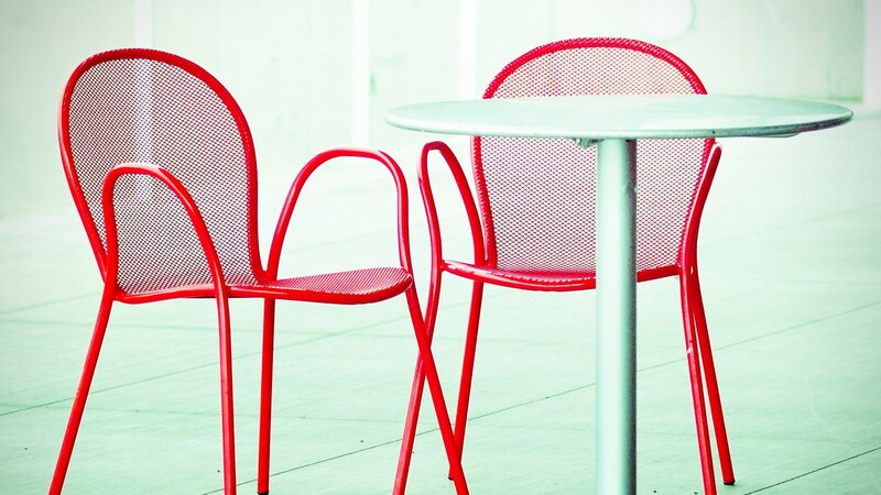 Red chairs and table