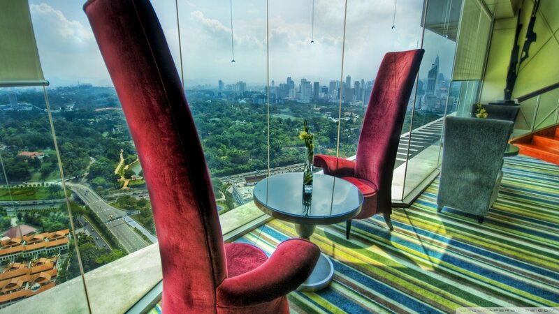 Red Chairs with City View
