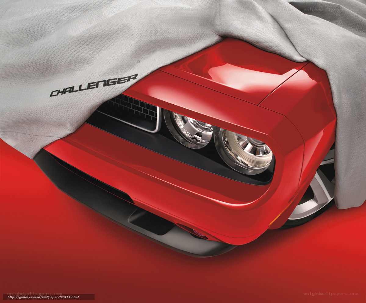 Red Challenger car under cover