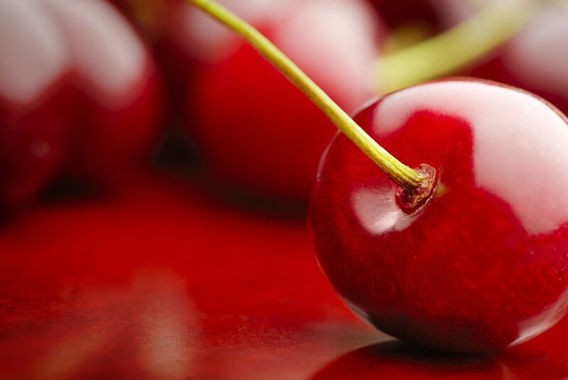 Red Cherry on Red Surface