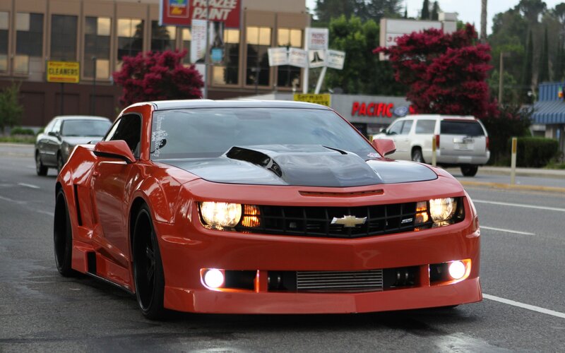 Red Chevrolet Camaro — Dramatic, Afternoon, Photograph, Car, Road, Building