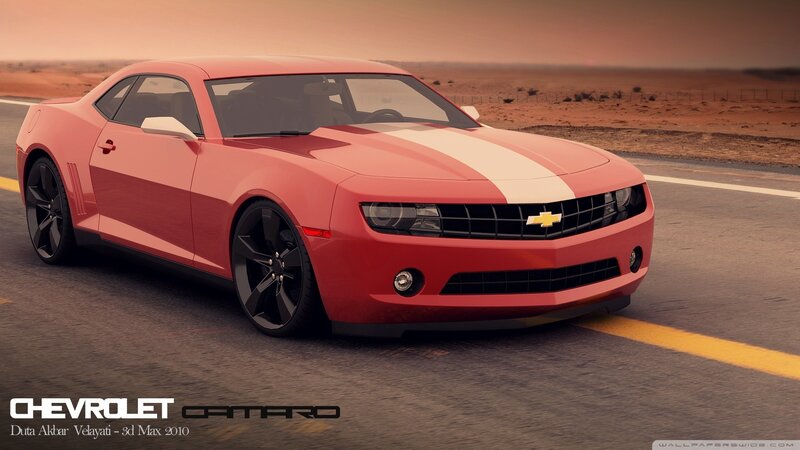 Red Chevrolet Camaro on desert road