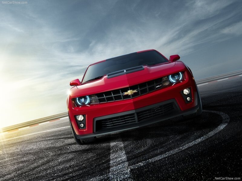 Red Chevrolet Camaro on racetrack