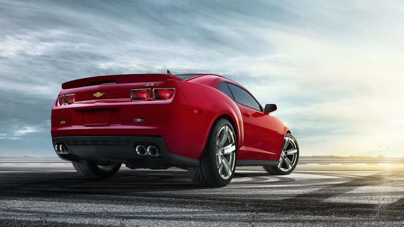 Red Chevrolet Camaro on racetrack