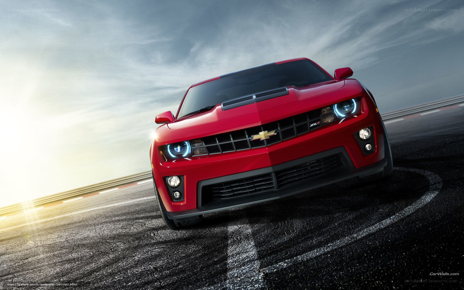 Red Chevrolet Camaro on racetrack