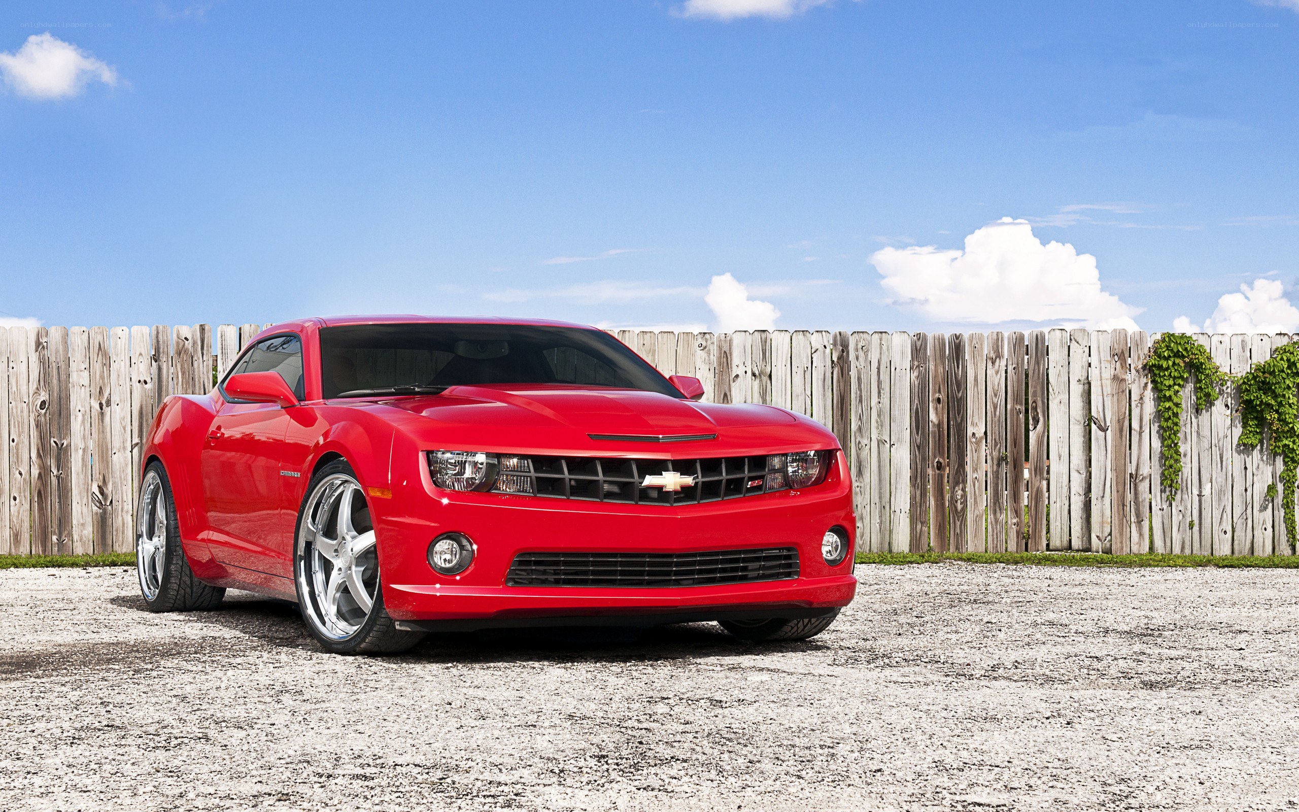 Red Chevrolet Camaro parked