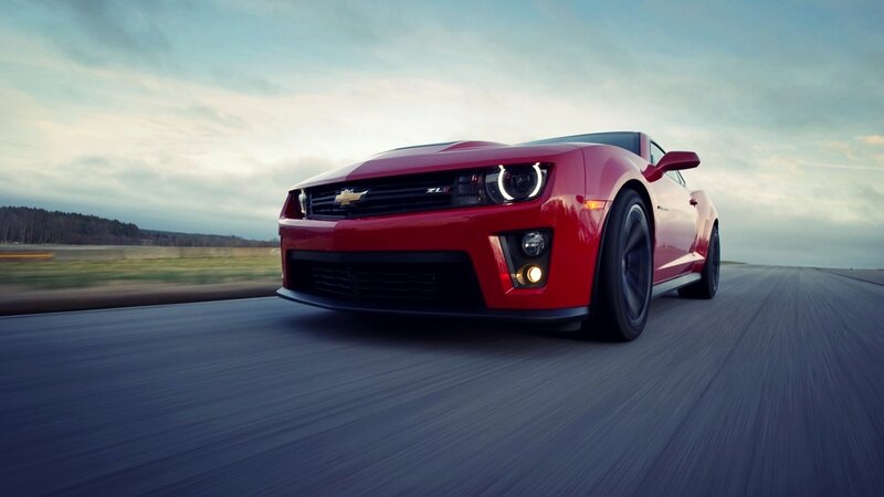 Red Chevrolet Camaro ZL1 on road