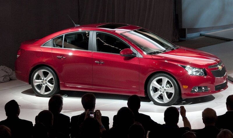 Red Chevrolet Cruze sedan on display