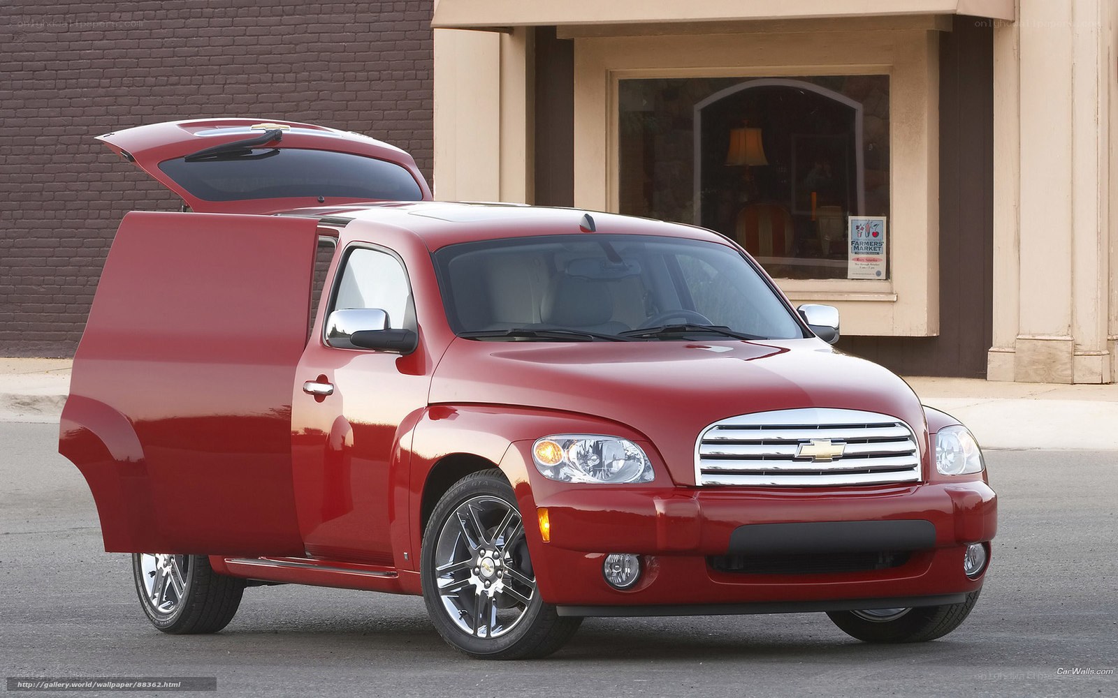 Red Chevrolet HHR with open doors
