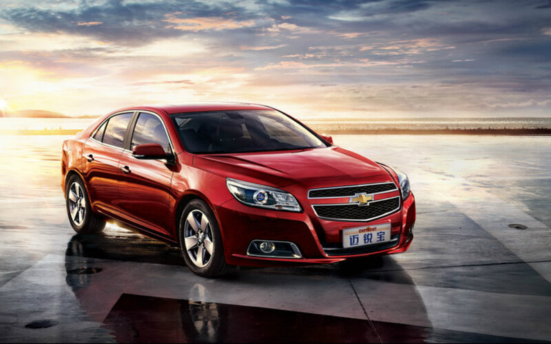 Red Chevrolet Malibu — Dramatic, Sunset