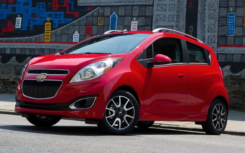 Red Chevrolet Spark compact car