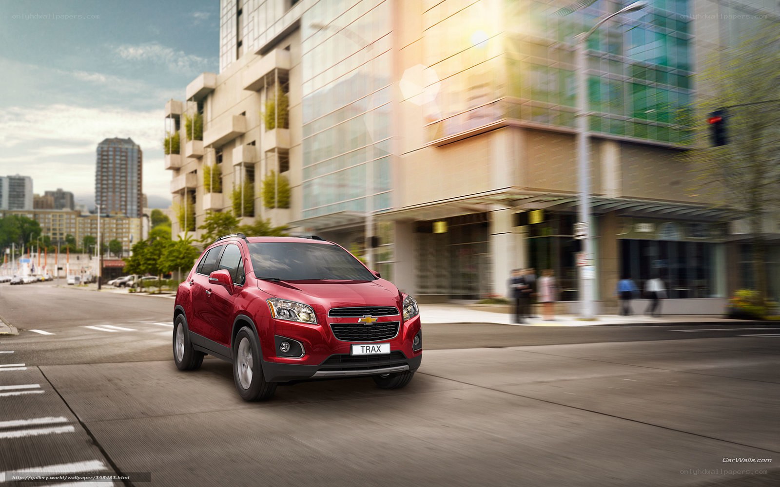 Red Chevrolet Trax in city