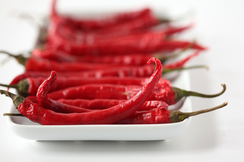 Red chili peppers on a plate