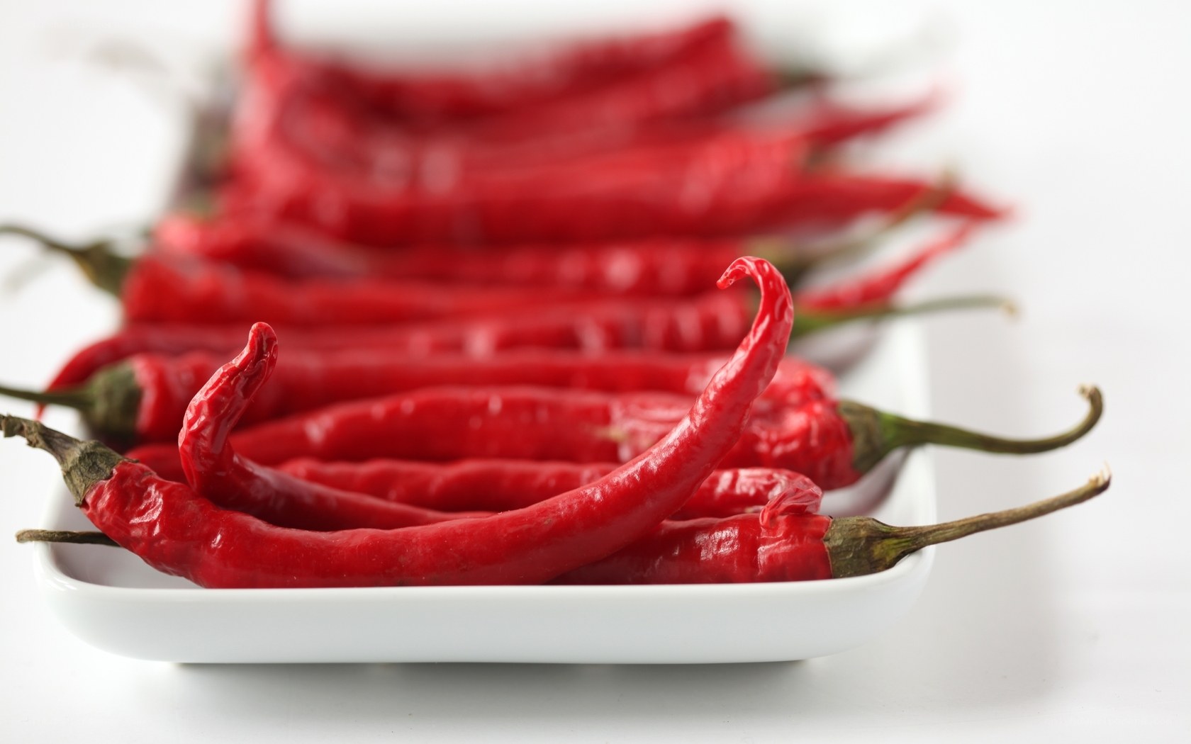 Red chili peppers on a plate