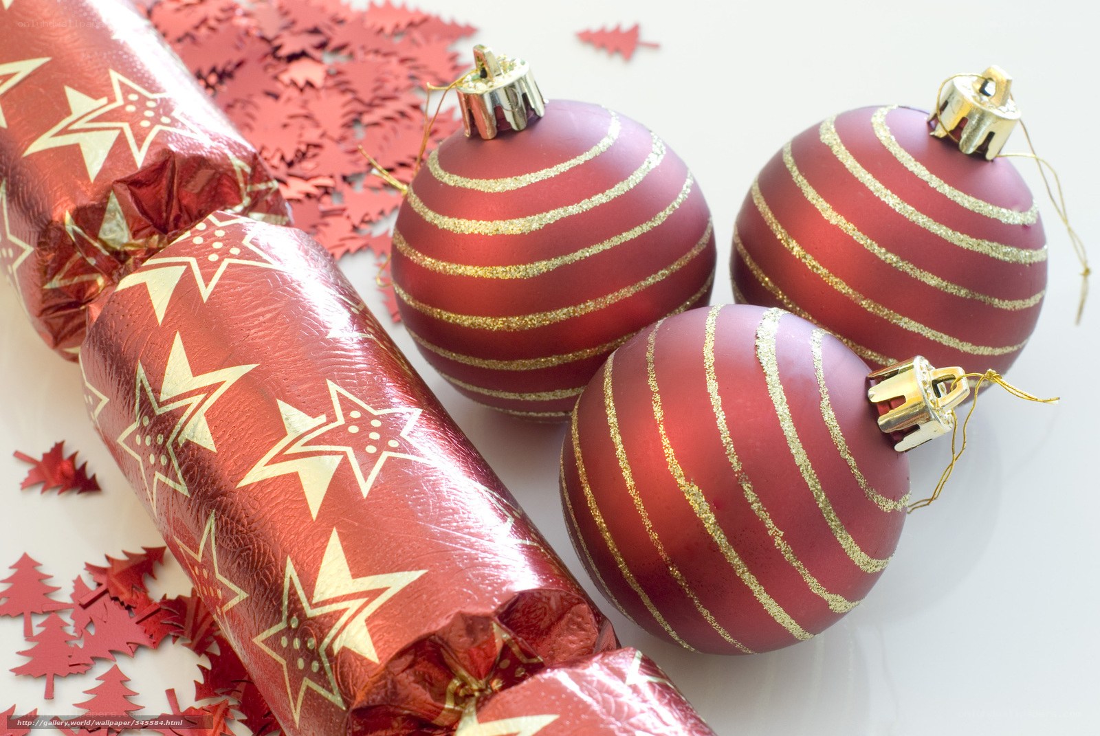 Red Christmas ornaments and crackers