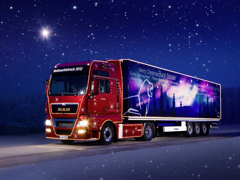 Red Christmas truck at night
