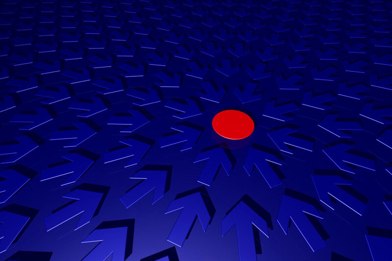 Red circle among blue arrows
