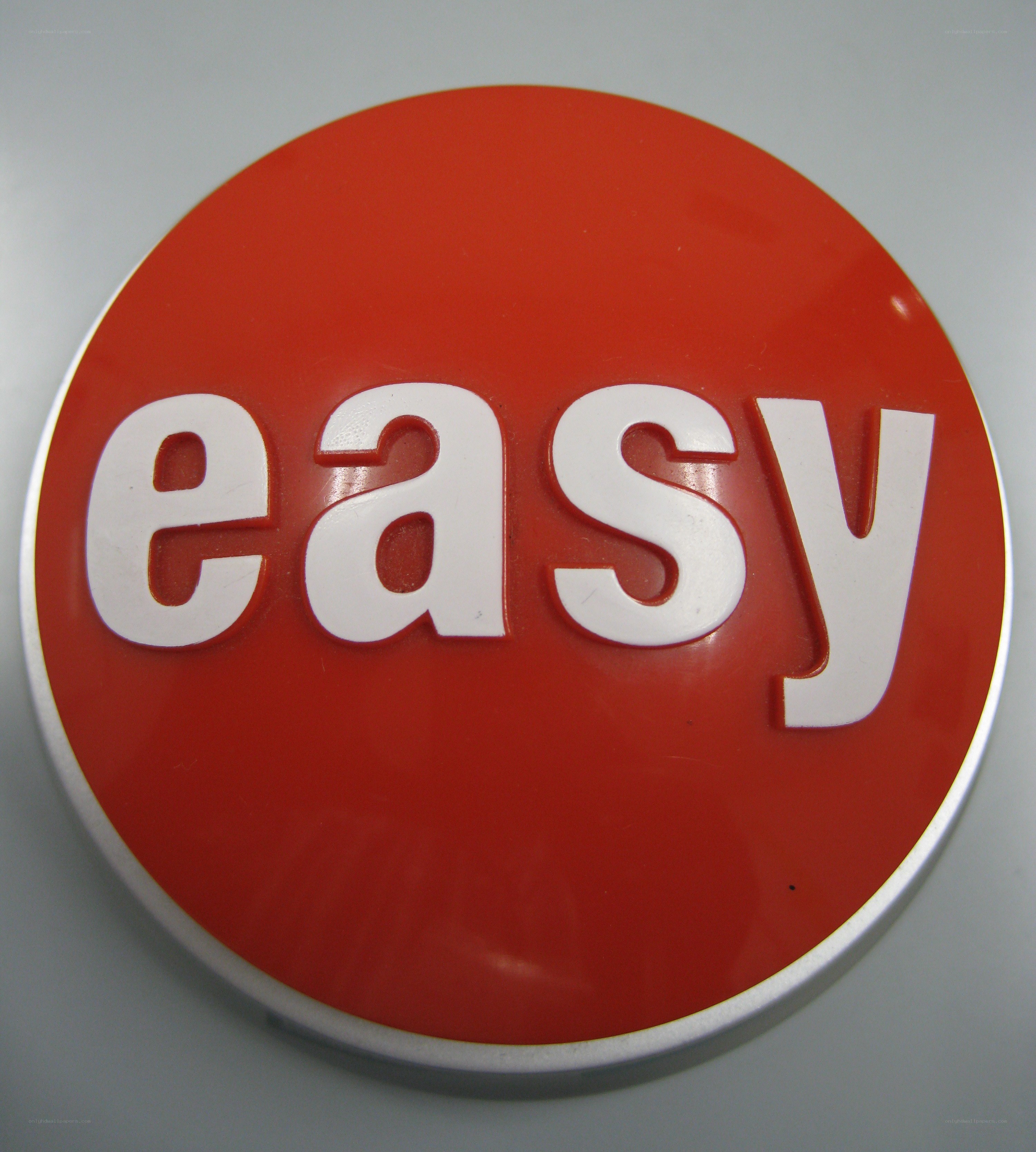 red circular sign with the word easy